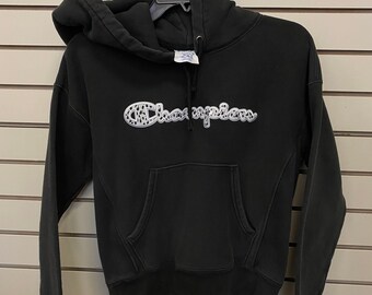 champion cow print hoodie