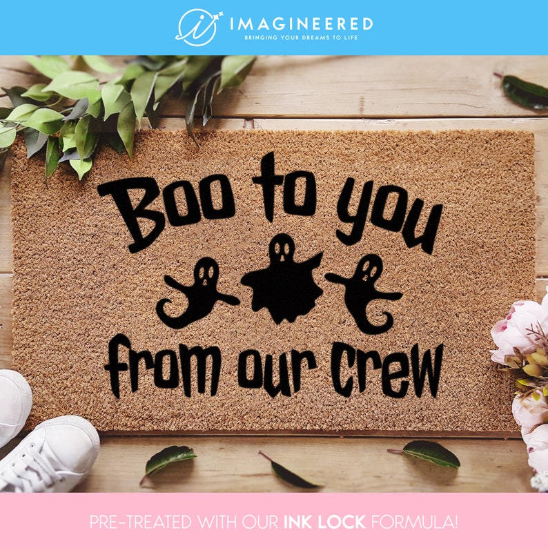 a door mat that says boo to you from our crew