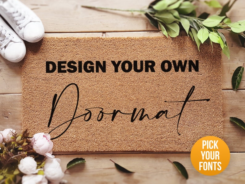 a door mat with the words design your own on it