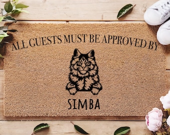 May include: A brown doormat with the text "ALL GUESTS MUST BE APPROVED BY SIMBA" in black lettering. A black silhouette of a cat is in the center of the doormat.