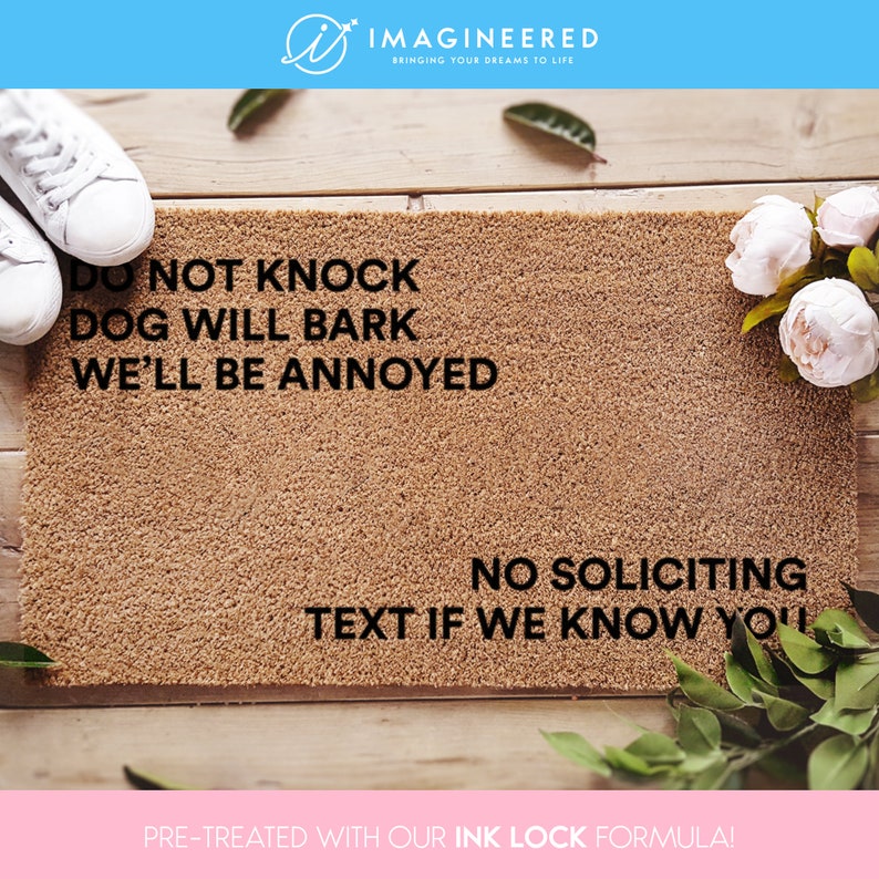 a door mat that says, not knock dog will bark we'll be annoyed