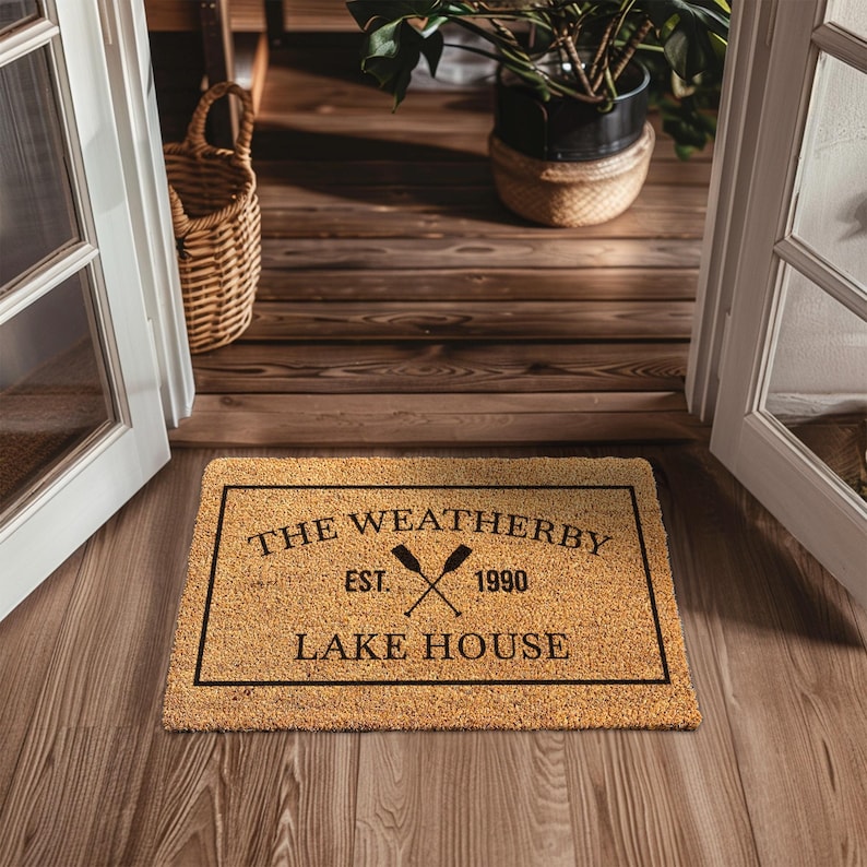 a door mat that says the weatherby estate lake house