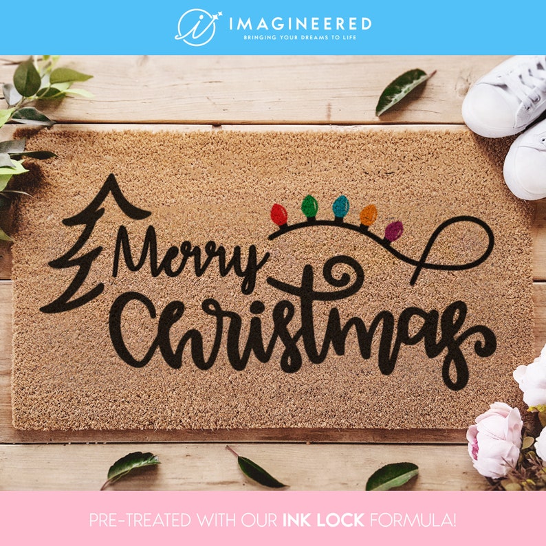 a door mat with the words merry christmas written on it