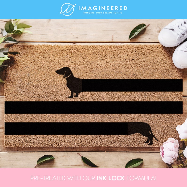 a door mat with a dachshund on it