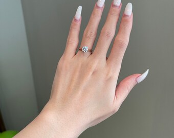 1 Carat Brilliant Round Moissanite 6-Prong Knife Edge Solitaire Engagement Ring