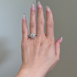 3 Carat Brilliant Round Moissanite 4-Prong Hidden Halo Pavé Cathedral Engagement Ring, D VVS1, 10K, 14K, 18K Gold & Platinum
