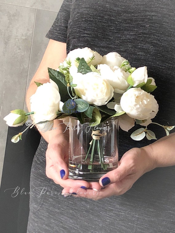 Pretty Pink Colour Peonies Flowers In White Vase Inside Of Light Warm  Living Room, Selective Close Up Focus On Bouquet, No People. Concept Of  Modern Cozy Residential Flat Interior Detail Decoration Stock