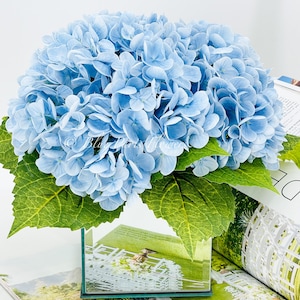 Blue Real Touch Hydrangea Arrangement: Faux Floral Centerpiece in Mirror Vase