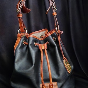 Vintage Dooney Bourke Black Leather w Brown Leather Trim Drawstring Bucket Bag