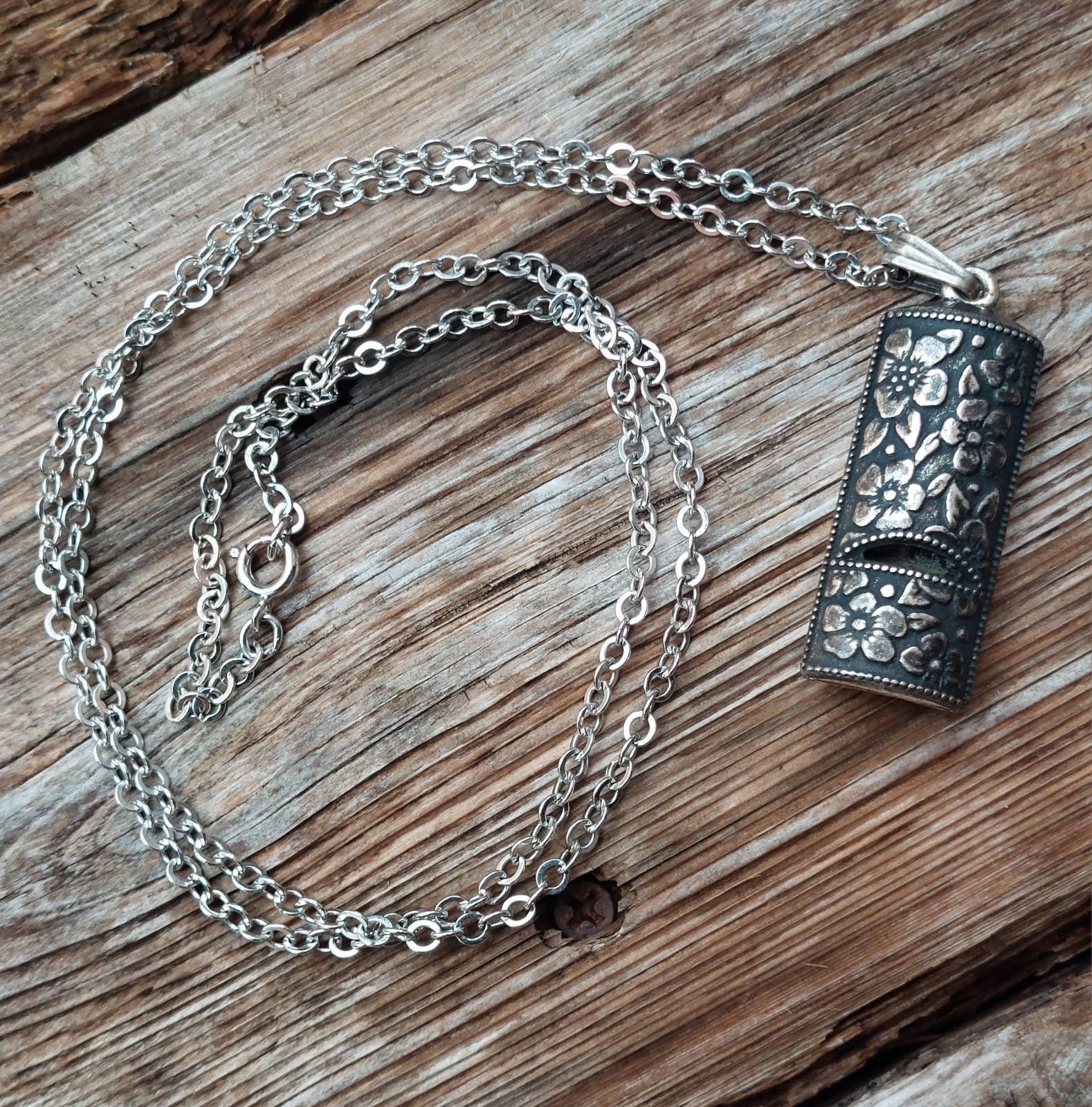 Avon whistle necklace sale