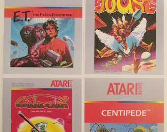 Atari 2600 Video Game Silver Box Art Reproduction Four 8.5x11 Poster Prints - E.T. The Extra-Terrestrial, Joust, Centipede, Galaxian - Decor