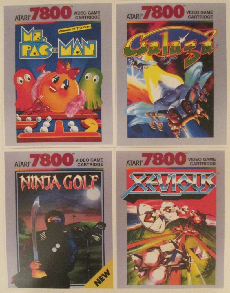 Atari 7800 Video Game Box Art Reproduction Four 8.5x11 Poster Prints - Ms. Pac-Man, Galaga, Ninja Golf, Xevious - Vintage Game Poster Decor. Atari vintage video game cover art from the Atari 2600 retro game console.