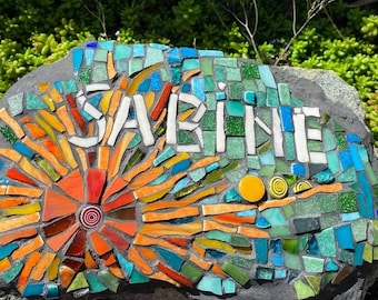 Offerings - Autographed and personalized pieces, customizable memorial plaques, funeral art, headstones, ornaments, cemetery.