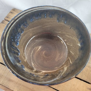 Large marbled pottery bowl with blue  drips