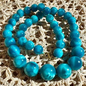 RARE Imori Victoria Stone Necklace 18k Gold Beads Original Vintage Quiet Blue Material from Dr. Iimori. 490cts, Graduated 11-16mm, Amazing!