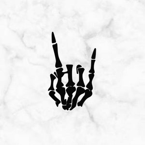 May include: Black skeleton hand making the rock and roll hand gesture with index and pinky fingers extended.
