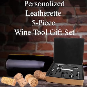 May include: A 5-piece wine tool gift set in a brown leatherette box. The set includes a corkscrew, a bottle stopper, a foil cutter, a wine pourer, and a bottle opener. The tools are silver and have a modern design.