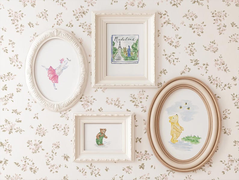May include: Four framed watercolor prints hang on a floral wallpaper background. The prints include a ballerina pig, a scene with the Eiffel Tower and the name "Madeline", a bear, and Winnie the Pooh with bees.