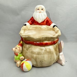 Vintage Fitz and Floyd Santa with tan Santa bag candy dish / bowl.