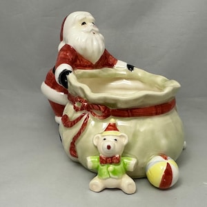 Vintage Fitz and Floyd Santa with greenish Santa bag candy dish / bowl.