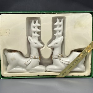 Vintage porcelain reindeer candle holders.