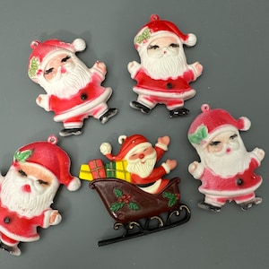Vintage Santa Christmas ornaments.