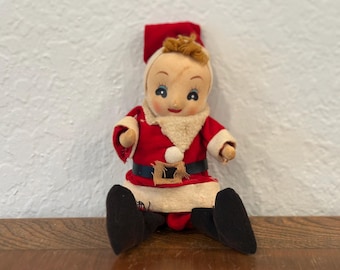 Vintage pixie Santa doll.