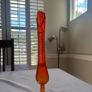 Amberina pedestal base swung vase
