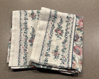 Set of two standard pillowcases cream colored with floral design and decorative edge border