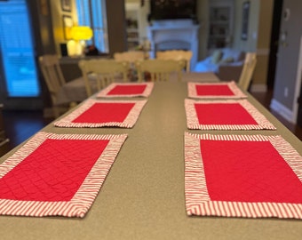 Rectangle quilted placemats, red with red and white striped border set of 6