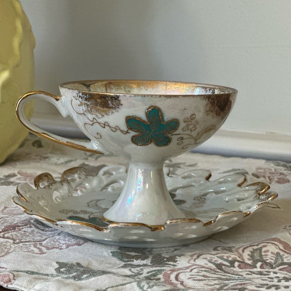 Porcelain teacup and saucer pearlescent/lusterware with tall pedestal base vintage made in Japan