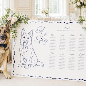 May include: A German Shepherd dog wearing a navy blue bow tie sits next to a white wedding seating chart. The sign features a dark blue line drawing of a dog, the text Sit & Stay, and a list of names organised by table numbers one through eight.