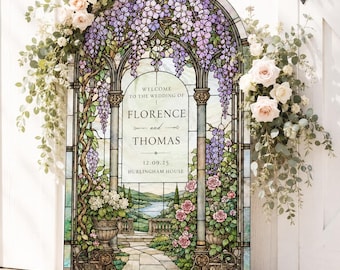 May include: An arched wedding welcome sign featuring a stained glass design with purple wisteria, pink roses, and a landscape scene. The text reads: Welcome to the wedding of Florence and Thomas, 12.09.25, Hurlingham House, framed by floral arrangements.