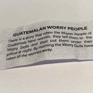 Guatamalan worry dolls in a textile pouch image 4