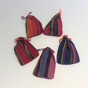 Guatamalan worry dolls in a textile pouch image 2