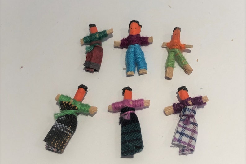 Guatamalan worry dolls in a textile pouch image 3
