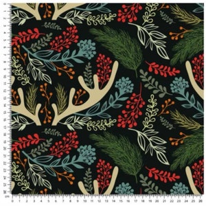 May include: A black fabric with a repeating pattern of white antlers, green pine needles, and red, orange, and blue berries.
