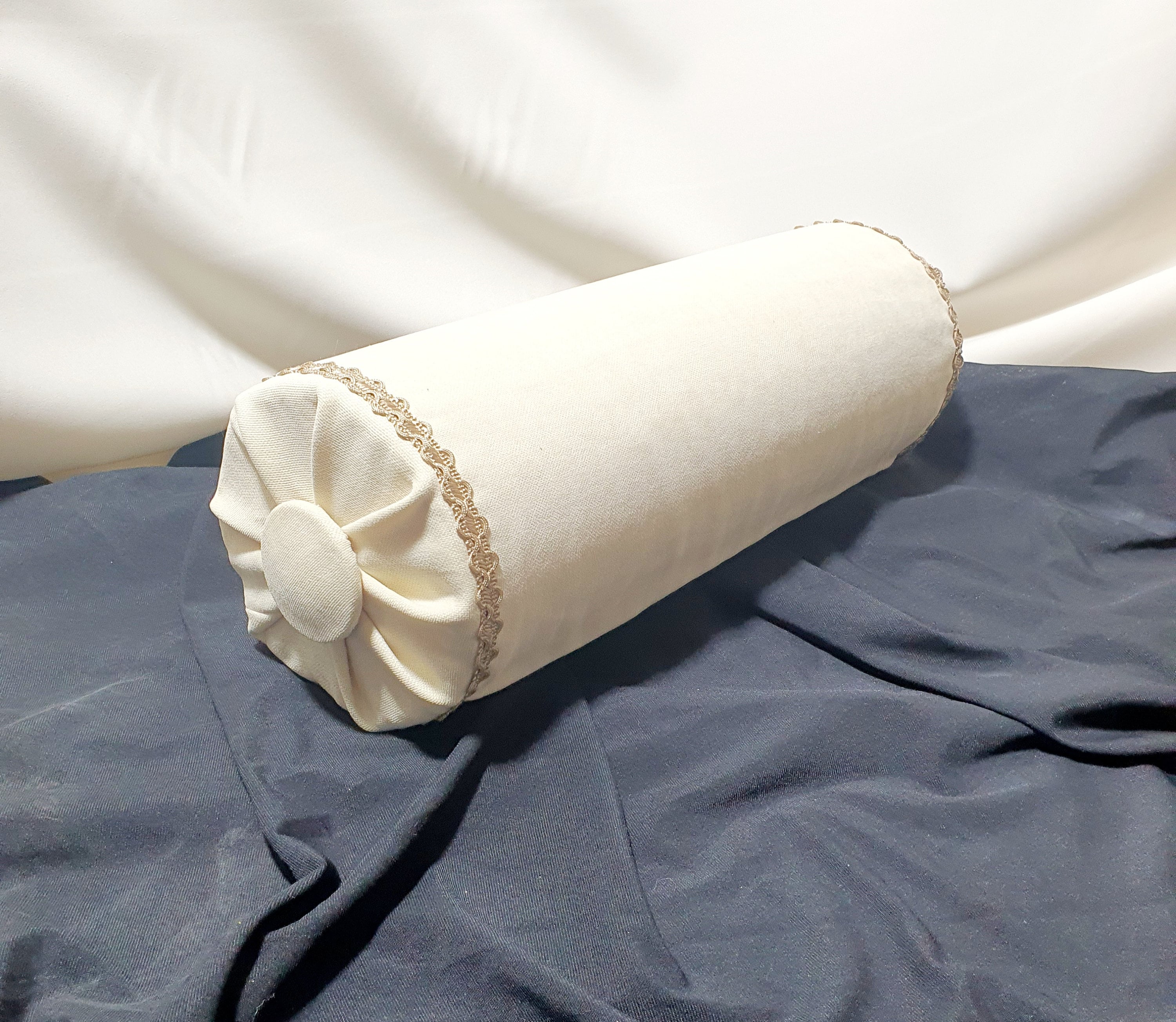 beige bolster pillow