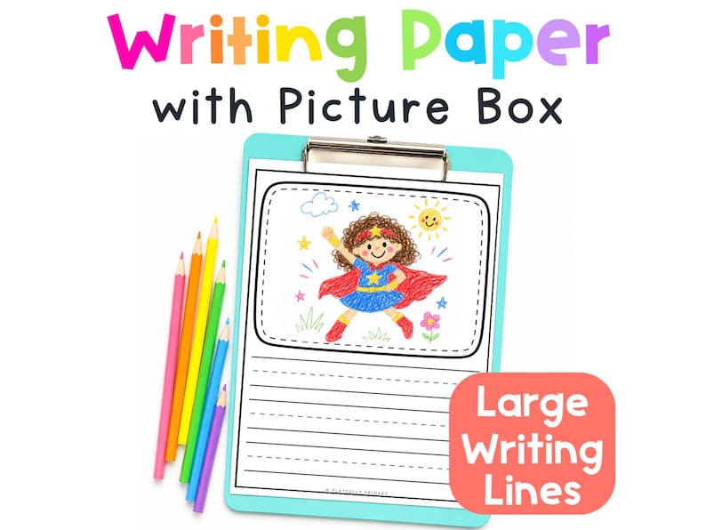 Printable preschool writing paper with a picture box and large handwriting lines, displayed on a turquoise clipboard with colored pencils.