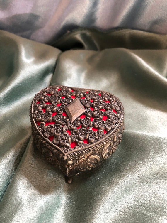 Small heart shaped metal trinket box