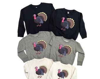 sweater with a turkey on it