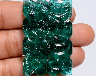 LAB CARVED GEMSTONE