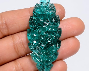 LAB CARVED GEMSTONE