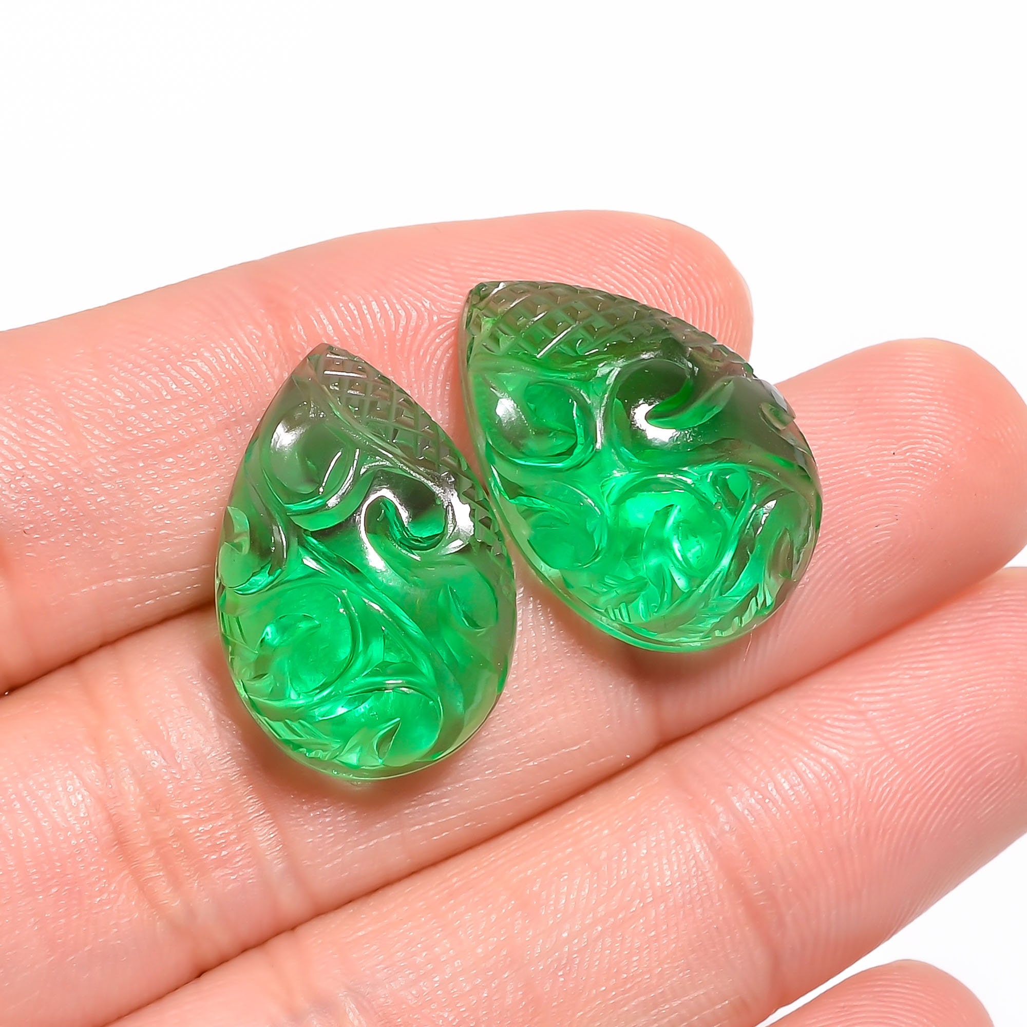 Polki and kundan earrings with engraved emerald green onyx 