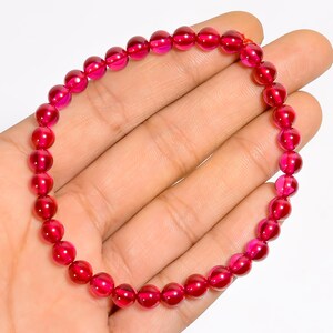 Lab Grown Pink Ruby Bracelet: Round Smooth Beads, Adjustable (76.5 Ct)