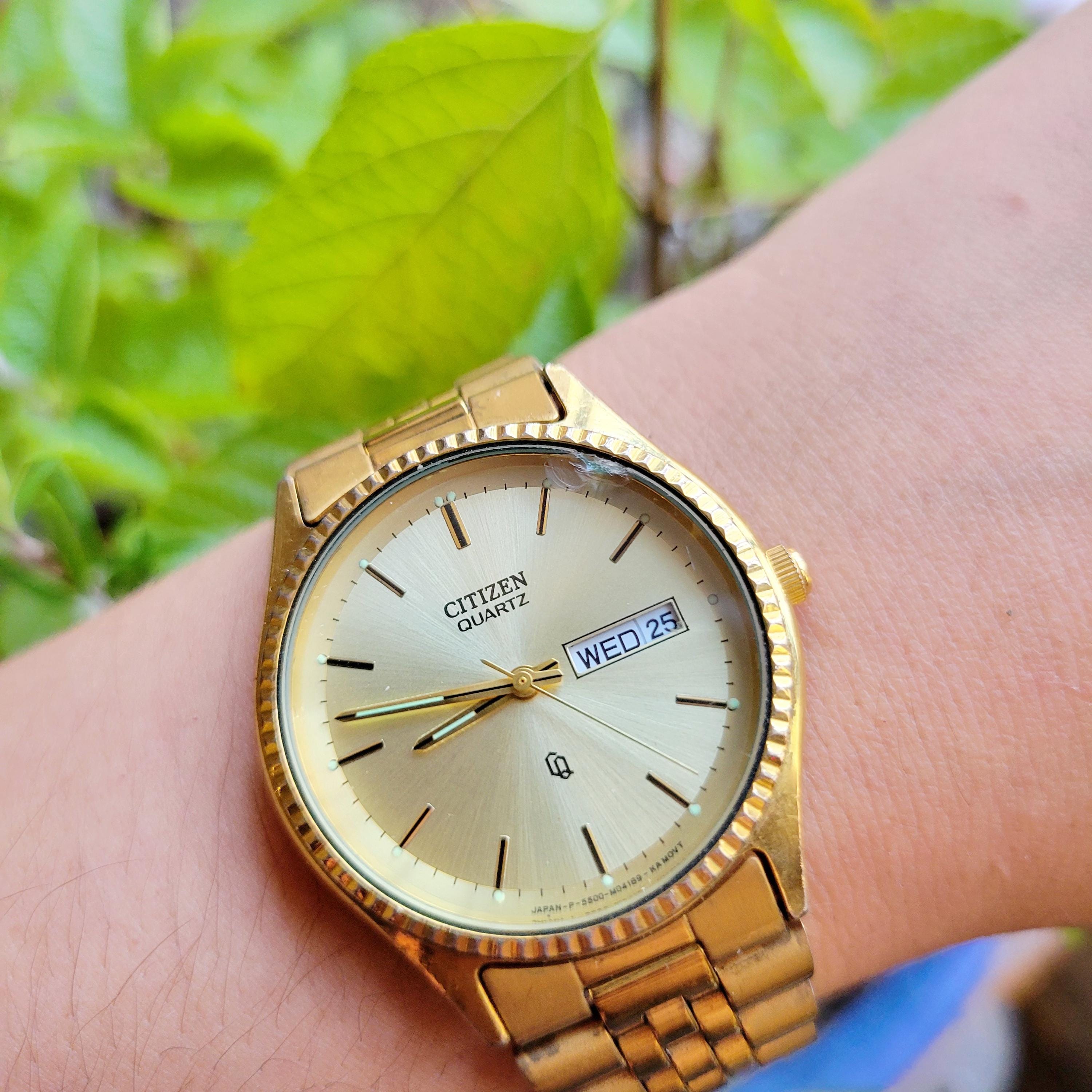 Classic Gold Citizen Quartz Glow in the Dark Calendar Watch Amazon.com: Citizen Quartz Mens Watch, Stainless Steel  main image 3