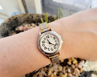 Elgin SWISS Quartz Ladies W/date Goldtone Stainless Steel Els48