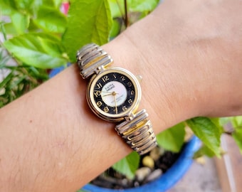 Kathy Ireland women\'s two-tone stretch band watch with mother of pearl face kathy ireland Wristwatches for sale - eBay main image 3