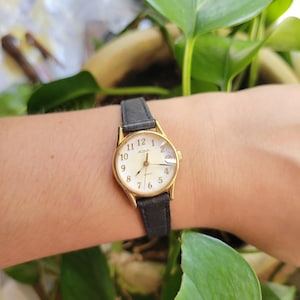 Vintage Acqua Quarz Schwarz & Gold Lederuhr