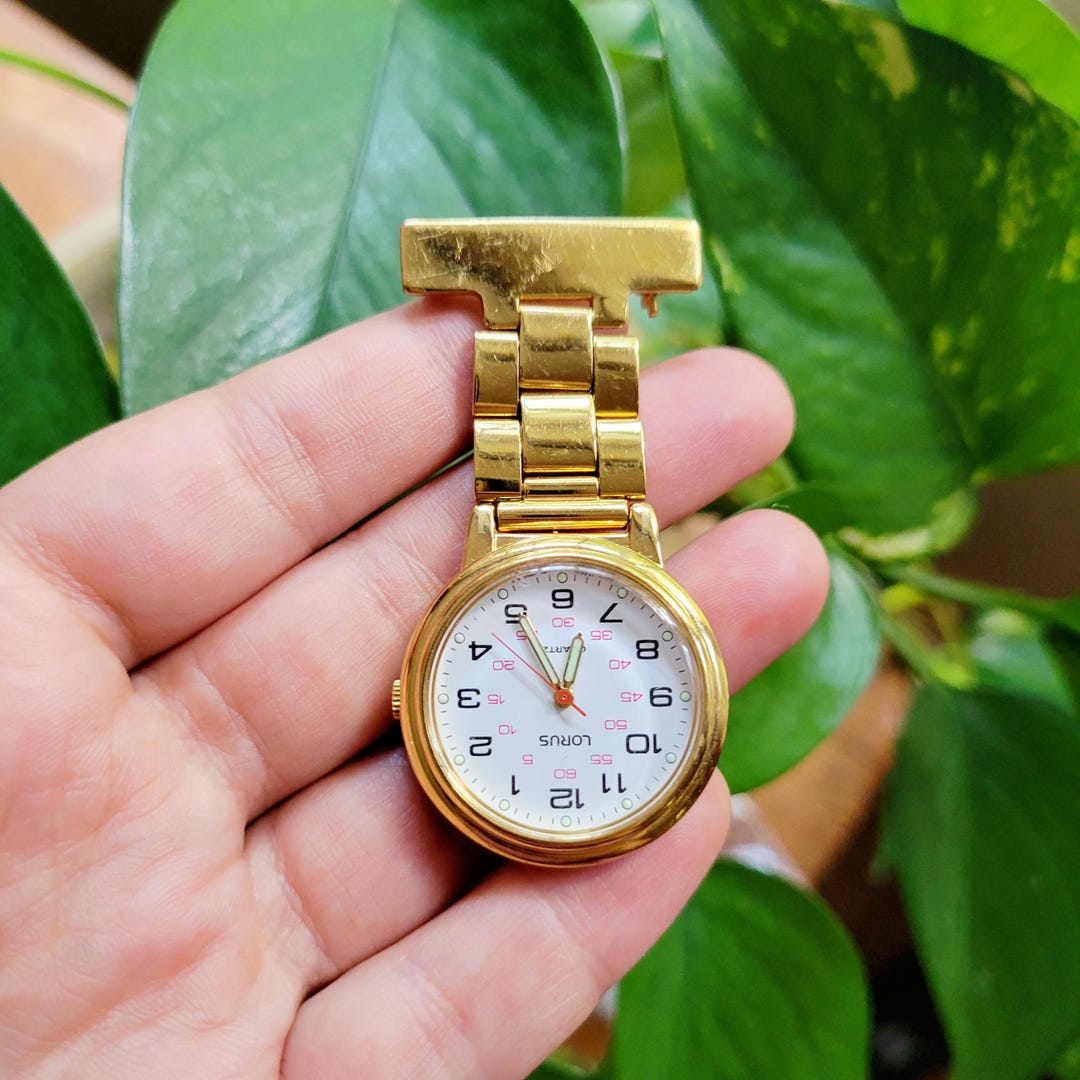 Classic Gold Lorus Nurses Lapel Pin Quartz Glow in the Dark Watch